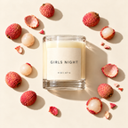 Girls Night candle surrounded by lychee fruit